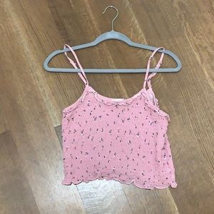 pink ruffled crop top with florals